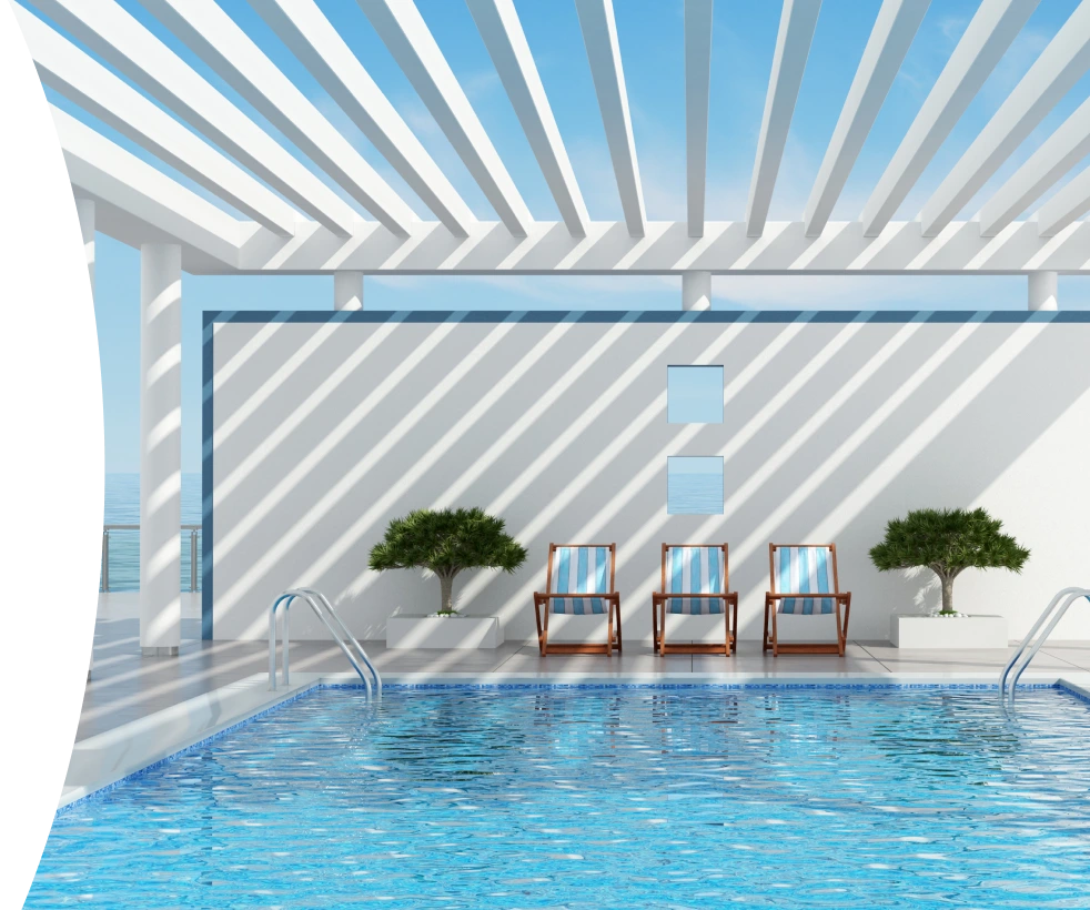 Modern outdoor pool with white walls and a custom structure providing shade.